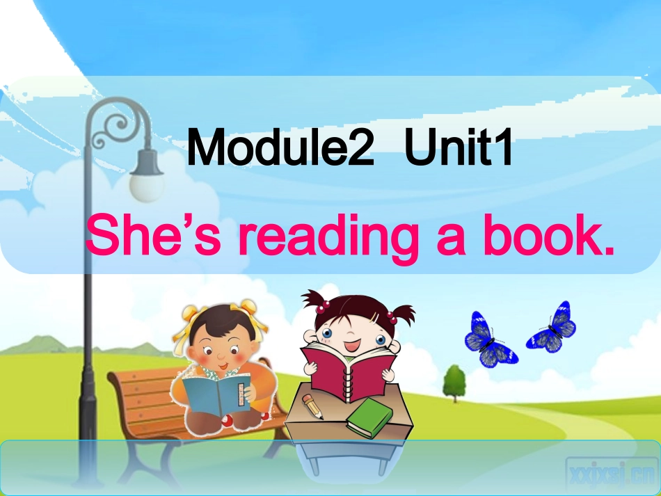 M2U1She'sreadingabook上课_第1页